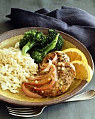 Turkey escalopes with orange sauce, rice and broccoli