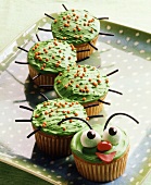 Amusing cup-cakes forming a caterpillar, for children