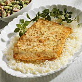 Salmon with mustard crust and oregano on bed of rice