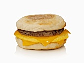 English muffin with beefburger, egg and cheese