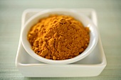 Turmeric in a Small White Bowl