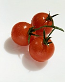 Three cherry tomatoes