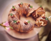 Marble cake with pecans, sliced