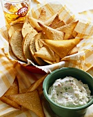 Creamy Herb Dip With a Bread Slices and Triangle Crisps For Dipping