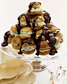 Pedestal Dish of Chocolate Chip Pistachio Ice Cream Puffs with Chocolate Sauce
