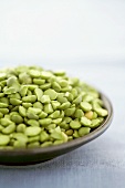 Green lentils in shallow dish