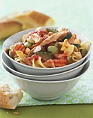 Ribbon pasta with chicken, vegetables and tomato sauce
