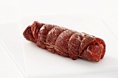 Rolled Beef Brisket on a White Background