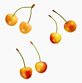 Six Cherries on a White Background
