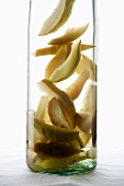 Pear Slices in a Tall Glass Bottle