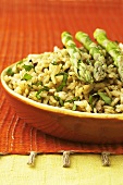 Bowl of Risotto with Basil and Whole Asparagus Spears