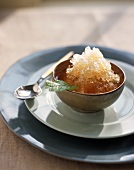 Small Bowl of Green Tea and Mint Granita on Plate with a Spoon