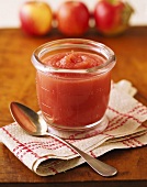 Applesauce in a Jar with Spoon