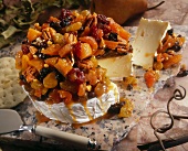 Brie Cheese Sliced Out with Caramelized Dried Fruit
