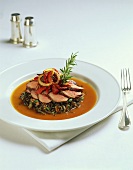 Sliced Duck Resting on a Bed of Wild Rice