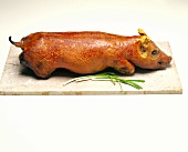 Whole Roasted Pig on a Marble Board