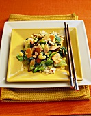 Vegetable Stir-Fry with Almonds on a Bed of Rice