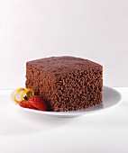 Piece of Chocolate Cake with Strawberry Garnish