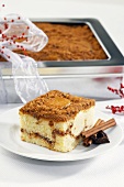 Piece of Coffee Cake on a Plate with Cinnamon Sticks, Coffee Cake as Gift
