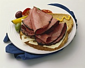 Open Faced Roast Beef Sandwich with Swiss and Mustard