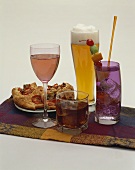 An Assortment of Alcoholic Beverages with Tomato Bread