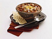 A Bowl of Chili with Crackers