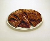Platter of Barbecue Pork Ribs on a White Background
