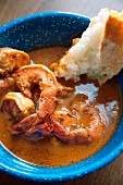 Bowl of New Orleans Barbecued Shrimp with Crusty Bread