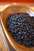 Organic Black Beans on a Wooden Dish