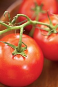 Organic Vine Ripened Tomatoes in a Wooden Bowl