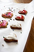 Decorated Heart Shaped Spritz Cookies on Parchment
