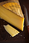 Wedge of French Cheese, Comte with Slice and Knife