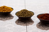 Ground Spices in Small Bowls; Raita Masala