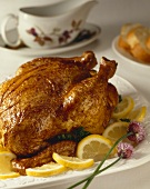 Roast Chicken on a Platter with Lemons and Chives