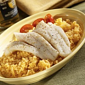 Halibut Fillets Poached in Beer Over Mexican Rice