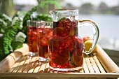 A Pitcher and Glasses of Sangria on a Tray, Outdoors