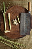 Lemon Grass, Whole and Sliced on a Cutting Board, Butcher Knife