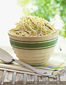 Serving Bowl of Cole Slaw on an Outdoor Table, Large Metal Serving Spoon