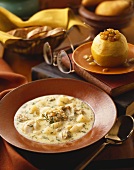 Bowl of New England Clam Chowder, Baked Stuffed Apple