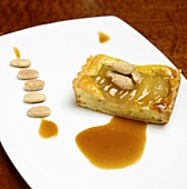 Apple tart with almonds and caramel sauce