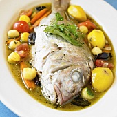 Whole Snapper in Broth with Root Vegetables, Tomatoes and Oiives