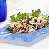 Seafood Salad; Shrimp, Calamari and Crab on Baby Field Greens
