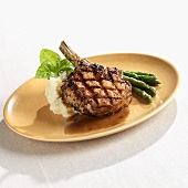 Fire Grilled Veal Chop with Mashed Potatoes and Asparagus