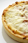 Close Up of a Deep Dish Pizza on a White Background