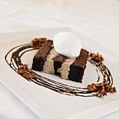 Piece of Layered Chocolate Cake with Vanilla Ice Cream