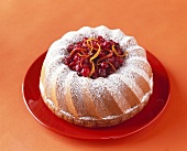 Bundt Cake Filled with Cranberries and Dusted with Powdered Sugar