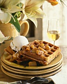 Waffles with caramelised apples and vanilla ice cream