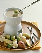 Brussels Sprout Dipping into Fondue