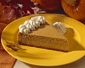 Slice of pumpkin Pie with Whipped Cream