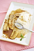 Partially Eaten Baked Bananas with Vanilla Ice Cream